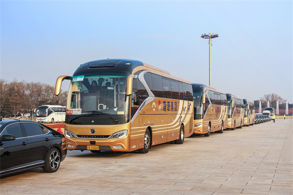 圆满完成严苛用车标准 金旅客车连续27年零故障服务两会